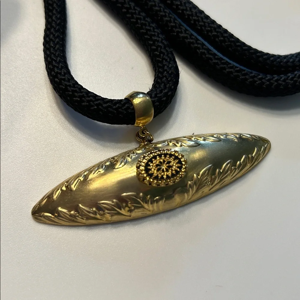 Gold Tone Geometric Engraved Pendant on Black Cord  Necklace‎ 36 Inch